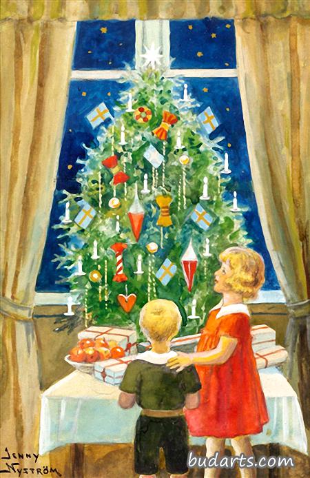 圣诞树旁的孩子们