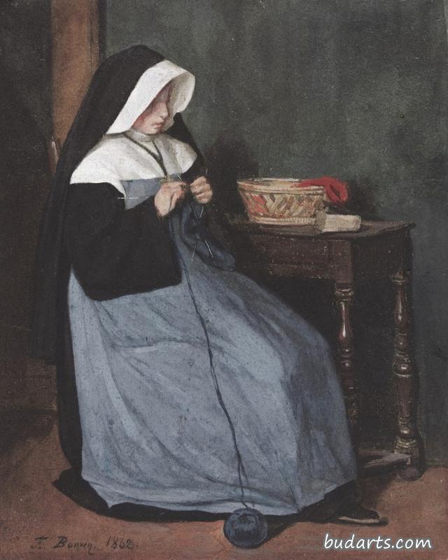 坐在桌前编织的修女