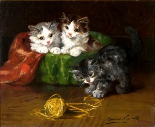 three kittens with a ball of yarn