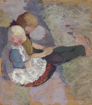 Two children sitting on a meadow