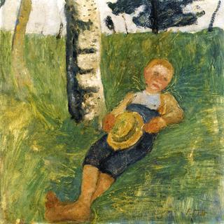 Young Man Lying in Grass next to a Birch Tree