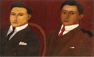 Two Young People in a Red Chair