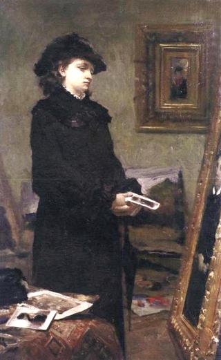Portrait of a young woman in the studio of the painter