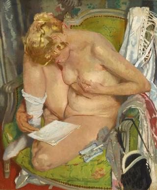 Nude girl reading