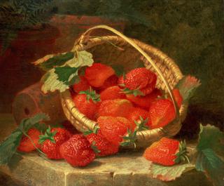 A Basket of Strawberries on a stone ledge