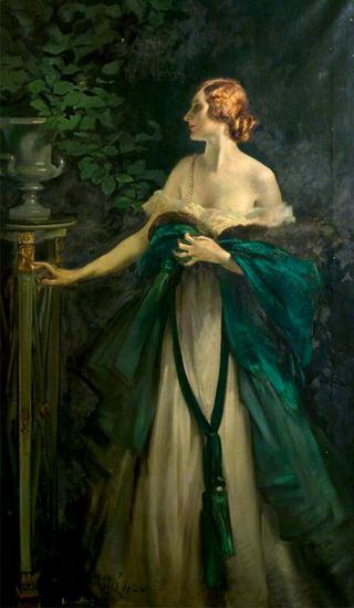 一位穿绿色衣服的女士的肖像