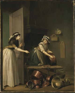 一个正在给铜盘做饭的女人