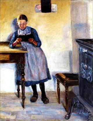Interior with a little girl in blue dress, reading a book