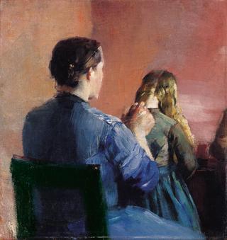 A mother plainting her little daughter's hair