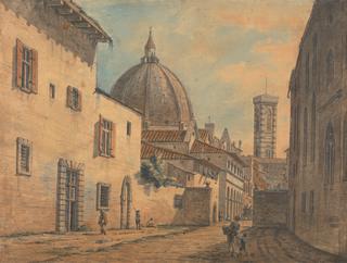 佛罗伦萨的一条街道，背景是教堂和钟楼