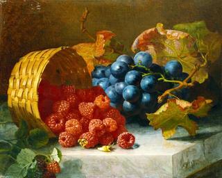 Still life with raspberries and grapes on a marble slab