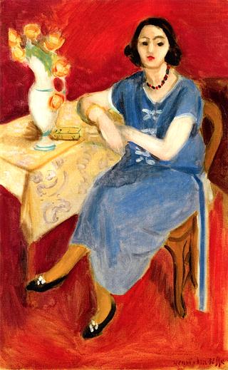 Woman in Blue at a Table, Red Background