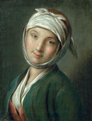 Portrait of a young woman with a white headscarf