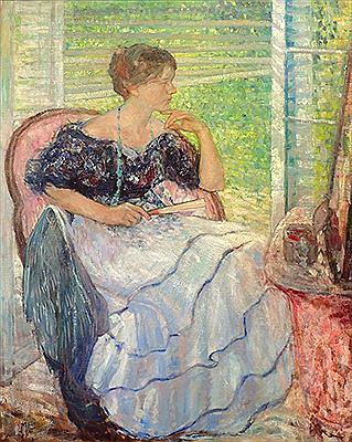 Young woman with fan near a sunny window