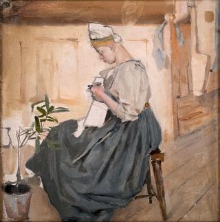 Mary Gallén sewing in a Karelian house