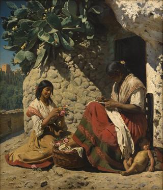 两个吉普赛女人在西班牙的小屋外