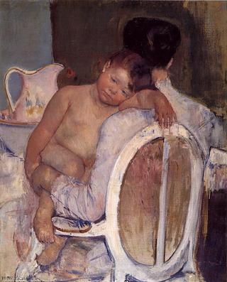 Seated woman with a child in her arms