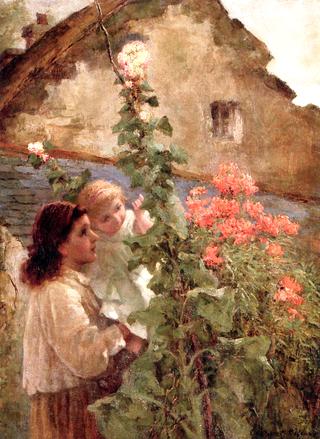 Young Woman Holding a Child beside Hollyhocks