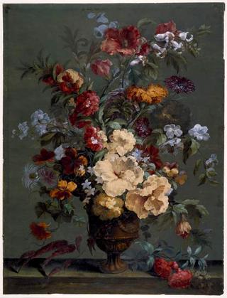 An arrangement of flowers including hibiscus, a campanula, delphinium and nasturtiums