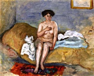 Nude Woman Seated on a Sofa
