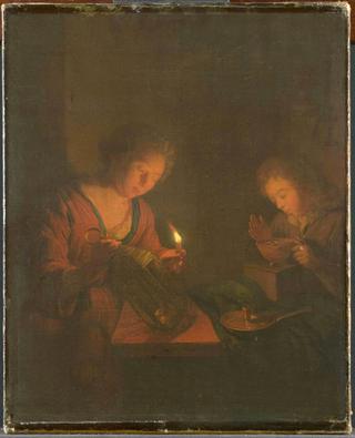 A girl placeing a candle in a lantern and a guy making fire for an oven