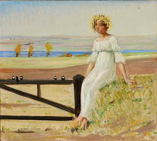 Young girl with flowers in her hair sitting on a fence