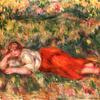 红白相间的女人躺在草地上