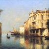威尼斯运河阳光明媚，附近有吊舱和渔船