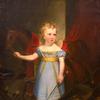 一个金发卷发，骑着摇摇木马的男孩的画像：昆西·亚当斯·肖小时候