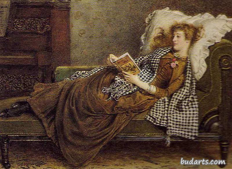 躺在昏厥的沙发上看书的女人
