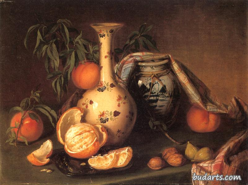 有花瓶、水果和坚果的静物画