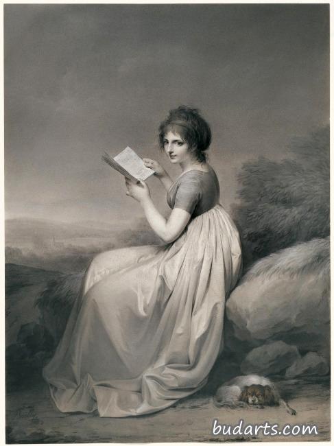 在风景中读书的年轻女人