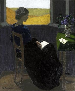 Young Woman Reading at the Window