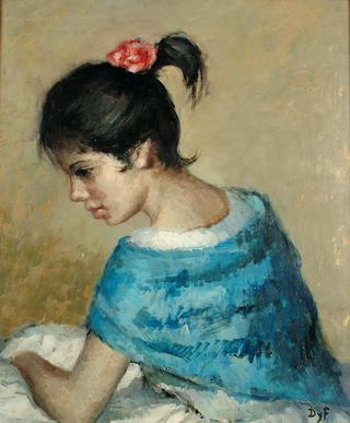 Portrait of a young girl in a blue shawl