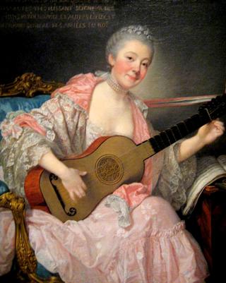 Woman Playing the Guitar