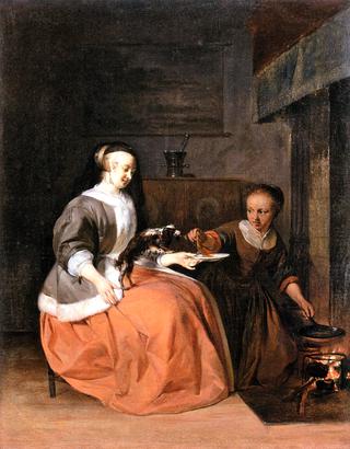 A Woman Feeding a Pancake to a Dog