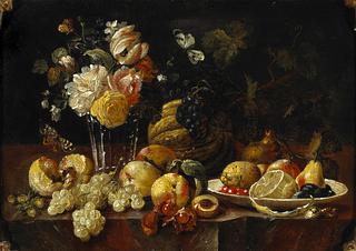 A still life with flowers in a glass vase, a lemon, cherries and other fruit in a porcelain vase