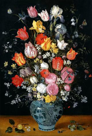 Still life with tulips, roses, lilies, irises, poppies, hyacinths and other flowers in a vase
