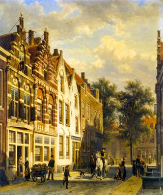 Figures on a Sunlit Street in a Dutch Town