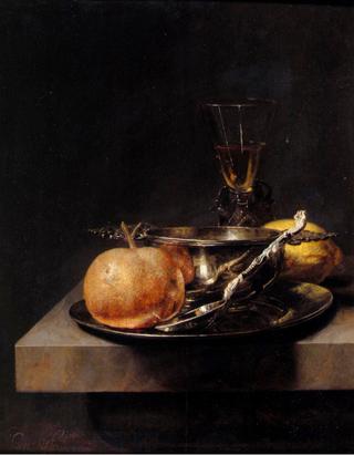 A Still Life of a Silver Brandy Cup, a Silver Spoon, an Apple, a Lemon, etc.