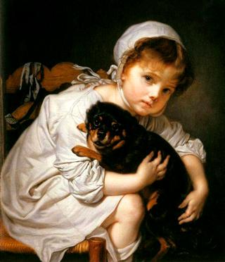 A Child Holding A Spaniel