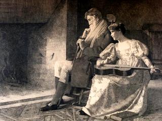 Old man and woman in front of a fireplace