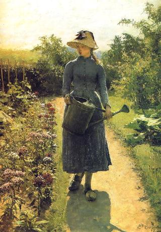 Young girl with watering can