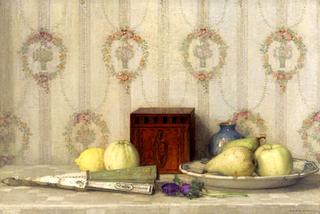 Still life of fruit beside a fan and tea caddy