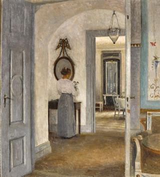 Interior with a Woman before a Mirror