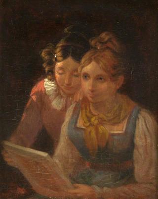 Two Girls Looking at a Picture