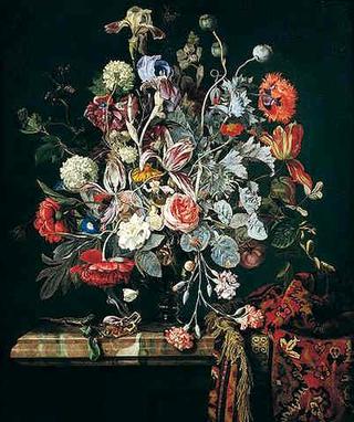 A still life of flowers in a glass vase