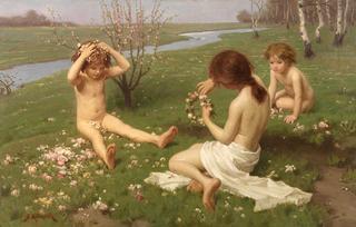 Children on a meadow in blossom