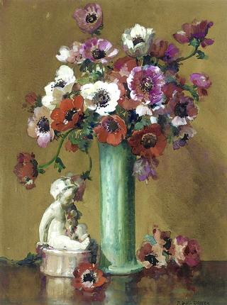 White, red and purple anemones in a green vase