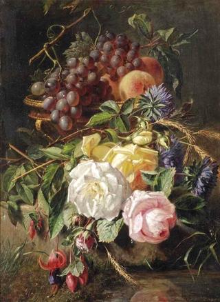 Roses, wild cornflowers, several other flowers, grapes and peaches in a vase on a stone ledge